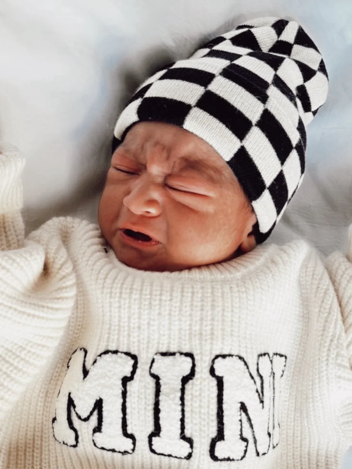 2-Pack Baby's First Hat®, Warm White & Black/Sand Checkerboard - Image 2